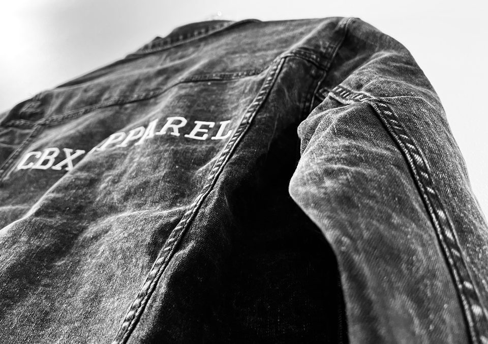 CBX Apparel embroidered on washed denim